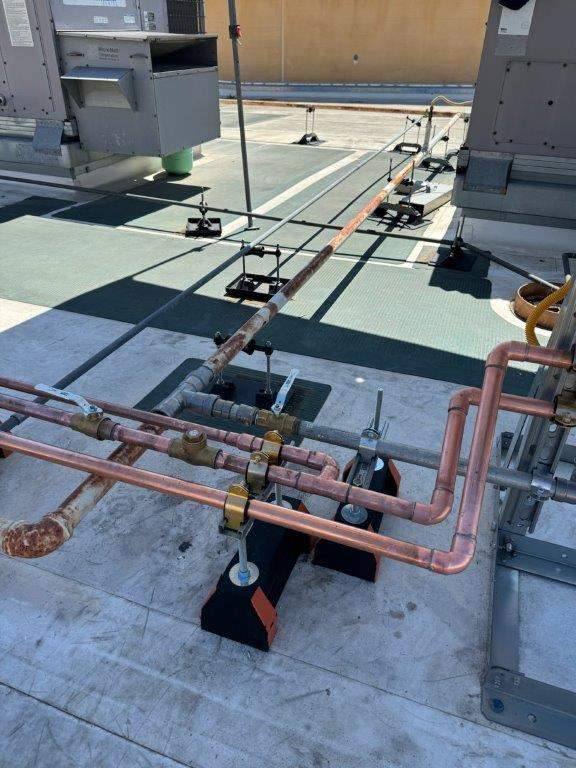 Rooftop copper pipe installation in Pomona Valley